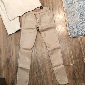 Bone pearlized AG Skinny jeans. Low waisted sz24.